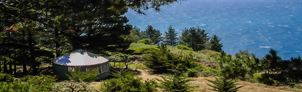 landscape with a yurt and ocean view